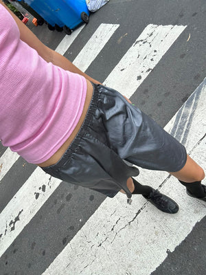Becca in the satin shorts